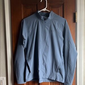 Under Armor fitted run jacket.